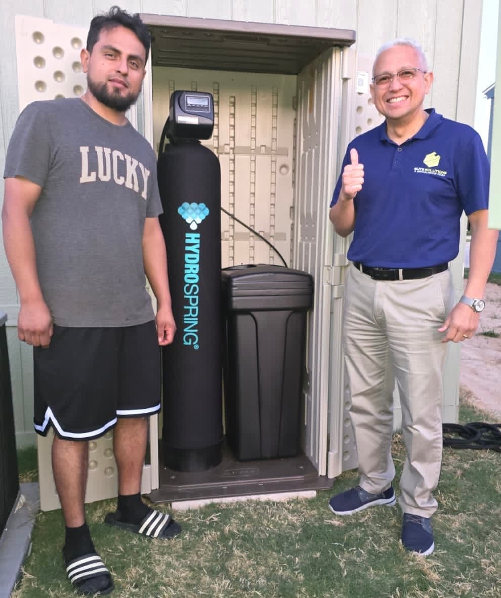 Family with their newly installed N&M water system