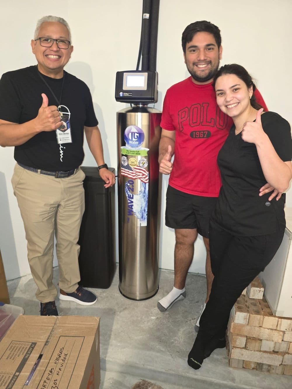 Happy family with their new Puronics water purification system