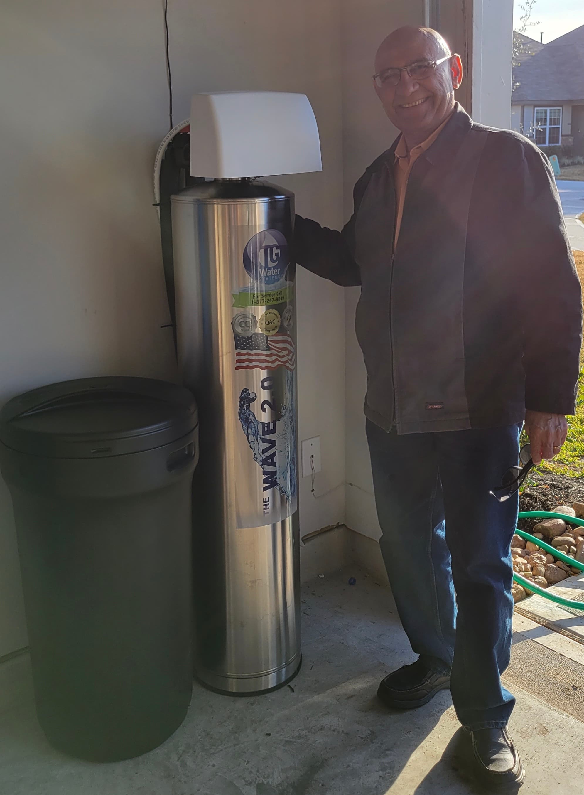 Happy customer with new water purification system