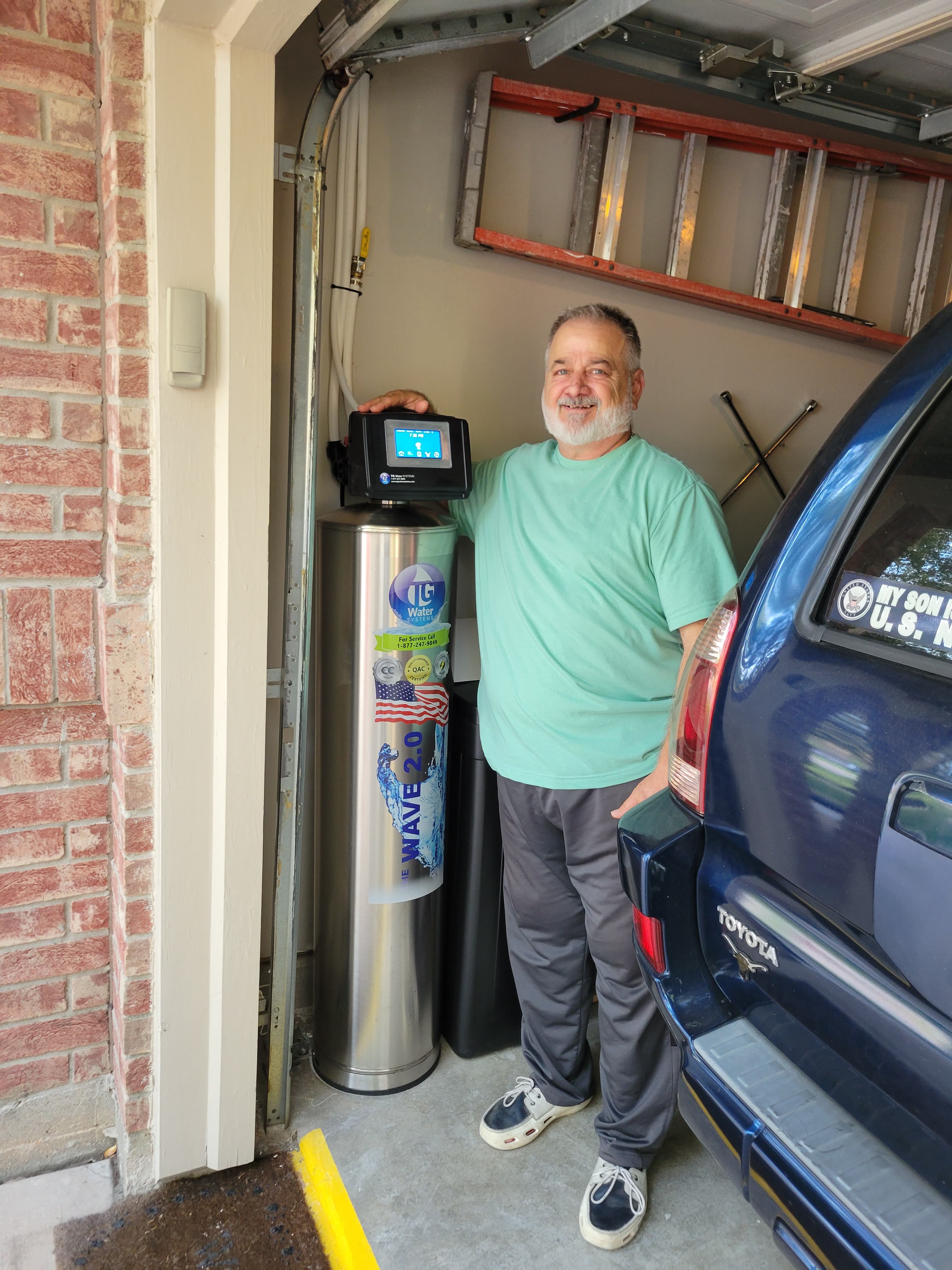 Family with new water system installed